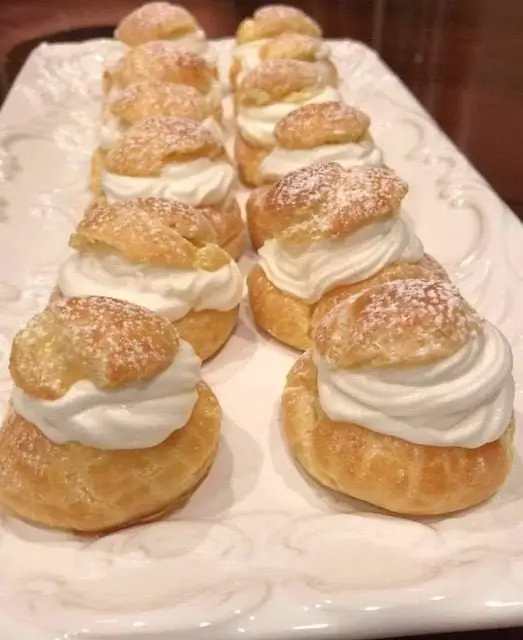 MOM’S FAMOUS CREAM PUFFS served on plate 
